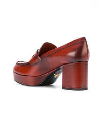 Коричневые кожаные массивные туфли от Prada