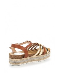 Коричневые кожаные сандалии на плоской подошве от Renda