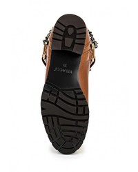 Коричневые кожаные сапоги от Vitacci