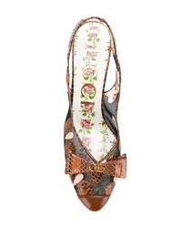Коричневые кожаные туфли со змеиным рисунком от Gucci