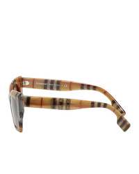 Женские коричневые солнцезащитные очки от Burberry