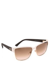 Женские коричневые солнцезащитные очки от Gucci