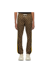 Мужские коричневые спортивные штаны с принтом от Gucci