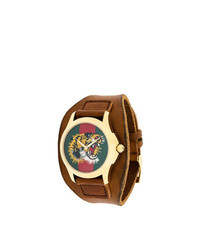 Женские коричневые часы от Gucci