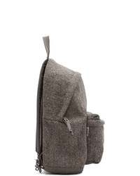 Мужской коричневый рюкзак из плотной ткани с узором "в ёлочку" от Eastpak