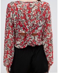 Красная блузка с принтом от TFNC