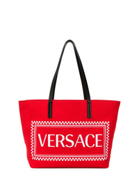 Красная большая сумка из плотной ткани с принтом от Versace