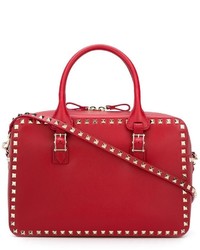 Красная большая сумка с шипами от Valentino Garavani