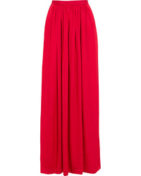 Красная длинная юбка со складками