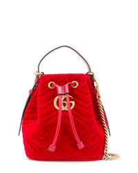 Красная замшевая сумка-мешок от Gucci