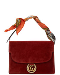 Красная замшевая сумка-саквояж от Gucci