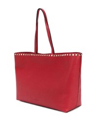 Красная кожаная большая сумка с шипами от Valentino