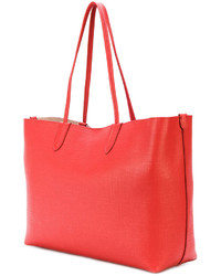 Красная кожаная большая сумка от Alexander McQueen