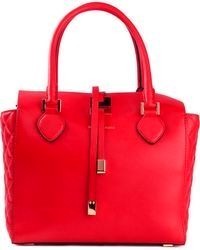 Красная кожаная большая сумка от Michael Kors
