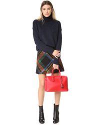 Красная кожаная большая сумка от MCM