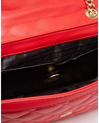 Красная кожаная стеганая сумка-саквояж от Love Moschino
