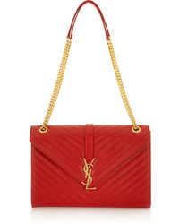 Красная кожаная стеганая сумка-саквояж от Saint Laurent