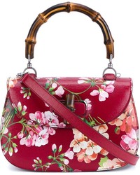 Женская красная кожаная сумка с принтом от Gucci