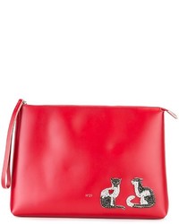 Красная кожаная сумка с украшением