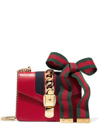 Женская красная кожаная сумка с украшением от Gucci