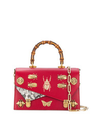 Красная кожаная сумка через плечо с принтом от Gucci