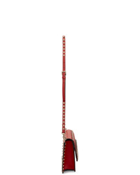 Красная кожаная сумка через плечо с украшением от Valentino