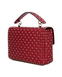 Красная кожаная сумка через плечо с шипами от Valentino