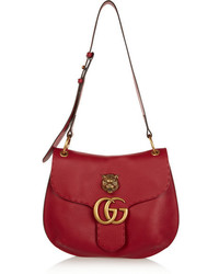 Красная кожаная сумка через плечо от Gucci