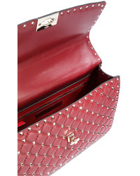 Красная кожаная сумка через плечо от Valentino Garavani