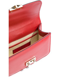 Женская красная кожаная сумка от Valentino Garavani