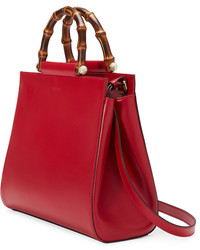 Женская красная кожаная сумка от Gucci