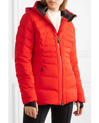 Женская красная куртка-пуховик от Kjus