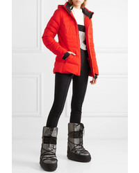 Женская красная куртка-пуховик от Kjus