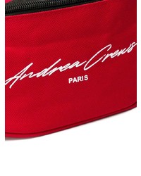 Красная поясная сумка от Andrea Crews