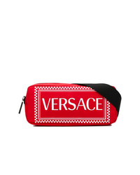Красная поясная сумка от Versace