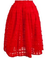 Красная пышная юбка с рельефным рисунком