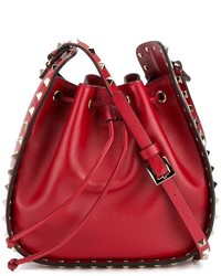 Красная сумка-мешок от Valentino Garavani