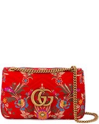 Женская красная сумка с принтом от Gucci
