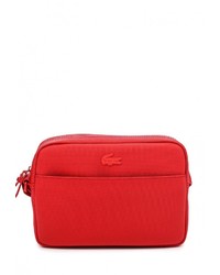 Красная сумка через плечо от Lacoste