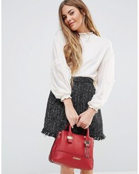 Женская красная сумка от Dune