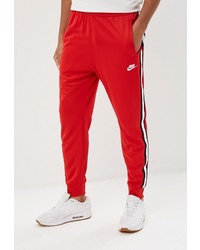 Мужские красно-белые спортивные штаны в вертикальную полоску от Nike