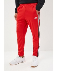 Мужские красно-белые спортивные штаны в вертикальную полоску от Nike