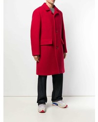 Красное длинное пальто от Raf Simons