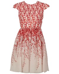 Красное платье с плиссированной юбкой с цветочным принтом от Giambattista Valli