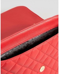 Женские красные брюки чинос от Love Moschino