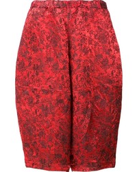 Женские красные брюки от Comme des Garcons