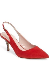 Красные замшевые туфли с украшением
