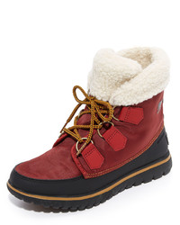 Женские красные зимние ботинки от Sorel