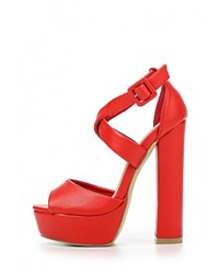 Красные кожаные босоножки на каблуке от Malien