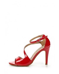 Красные кожаные босоножки на каблуке от Raxmax